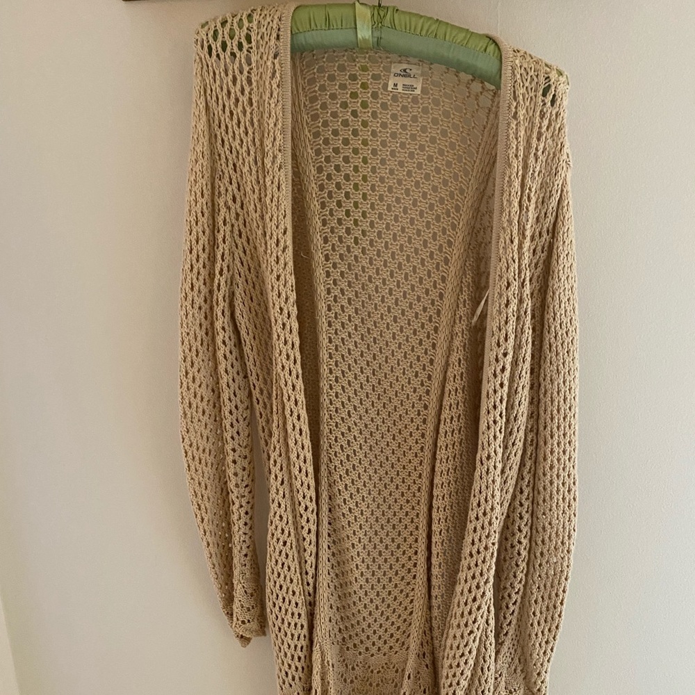 O’Neill beige cardigan.